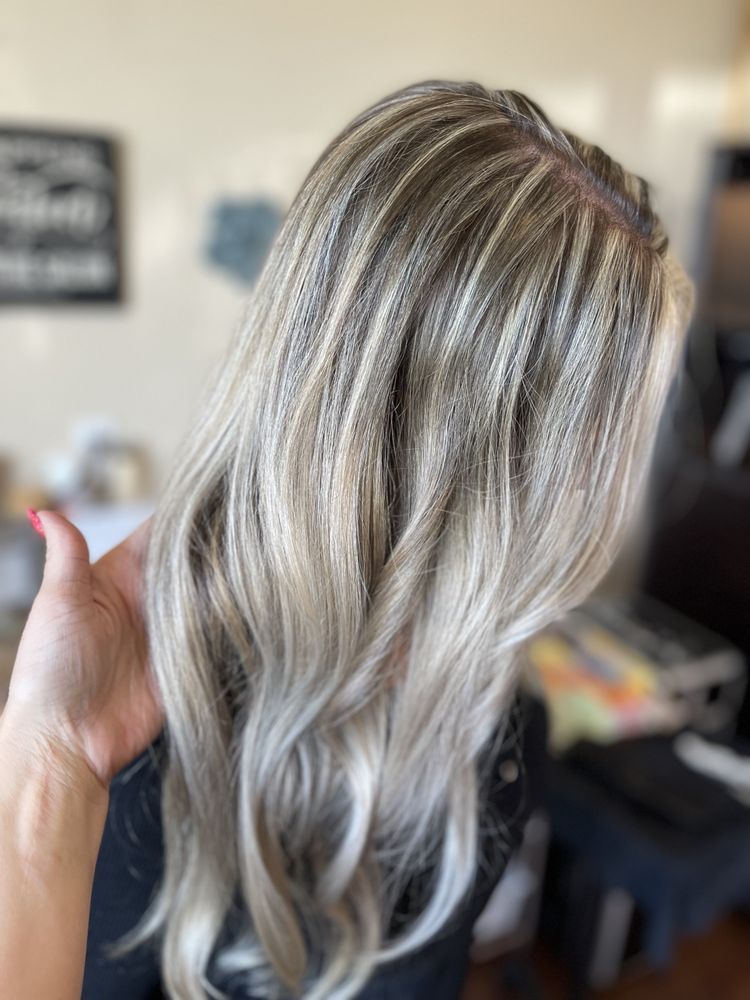 Cool ash blonde with high-contrast highlights and root smudge at JN Couture Salon Hayden Idaho